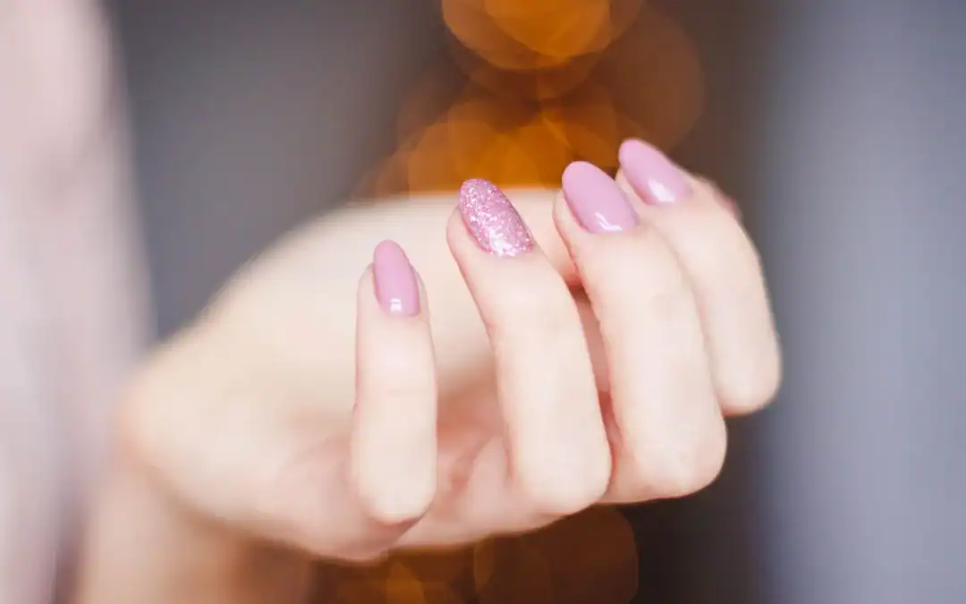 9 baddie nail ideas, from long French tips to a red stiletto with raised detail.