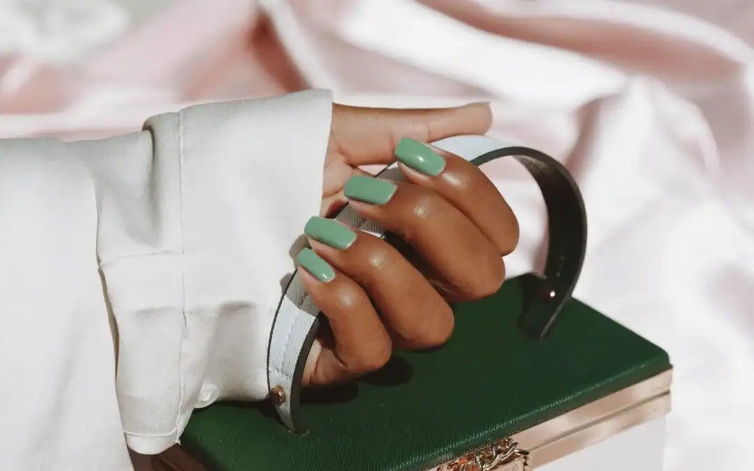 7 green nail designs, from soft sage to forest green and teal.
